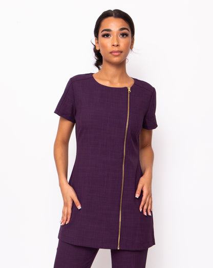 plum spa and beauty uniforms with gold zip
